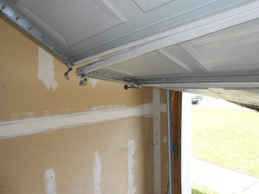 garage door damaged on a home inspection